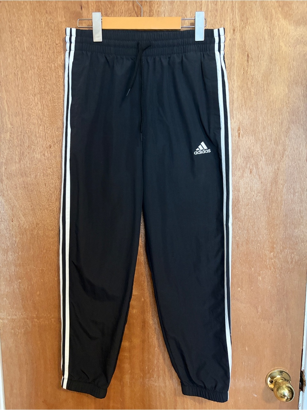 Adidas women’ Black Track Pants with White Stripes
